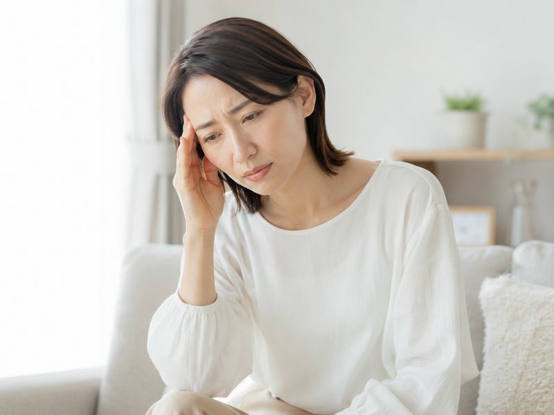 めまいに悩む女性